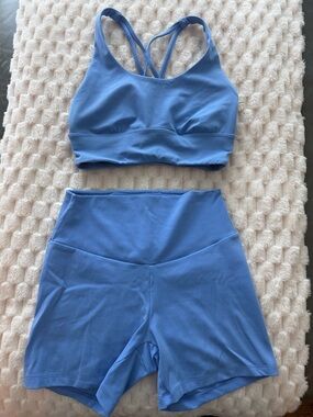 Oysho Blue Strappy Sports Bra and High-Waist Bike Shorts Set